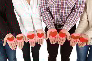 image of people holding heart shapes in their hands - addiction recovery support for alcohol and substance abuse - hired power offers recovery assistance services - sober coaches - sober companions in southern california and nationwide