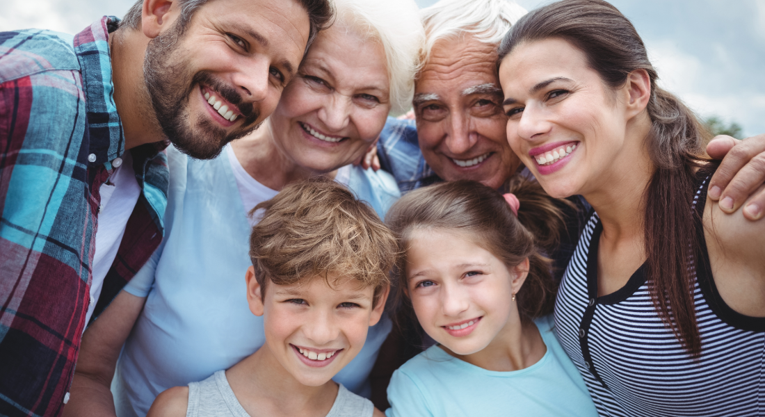Family photo with grandparents, parents, and kids